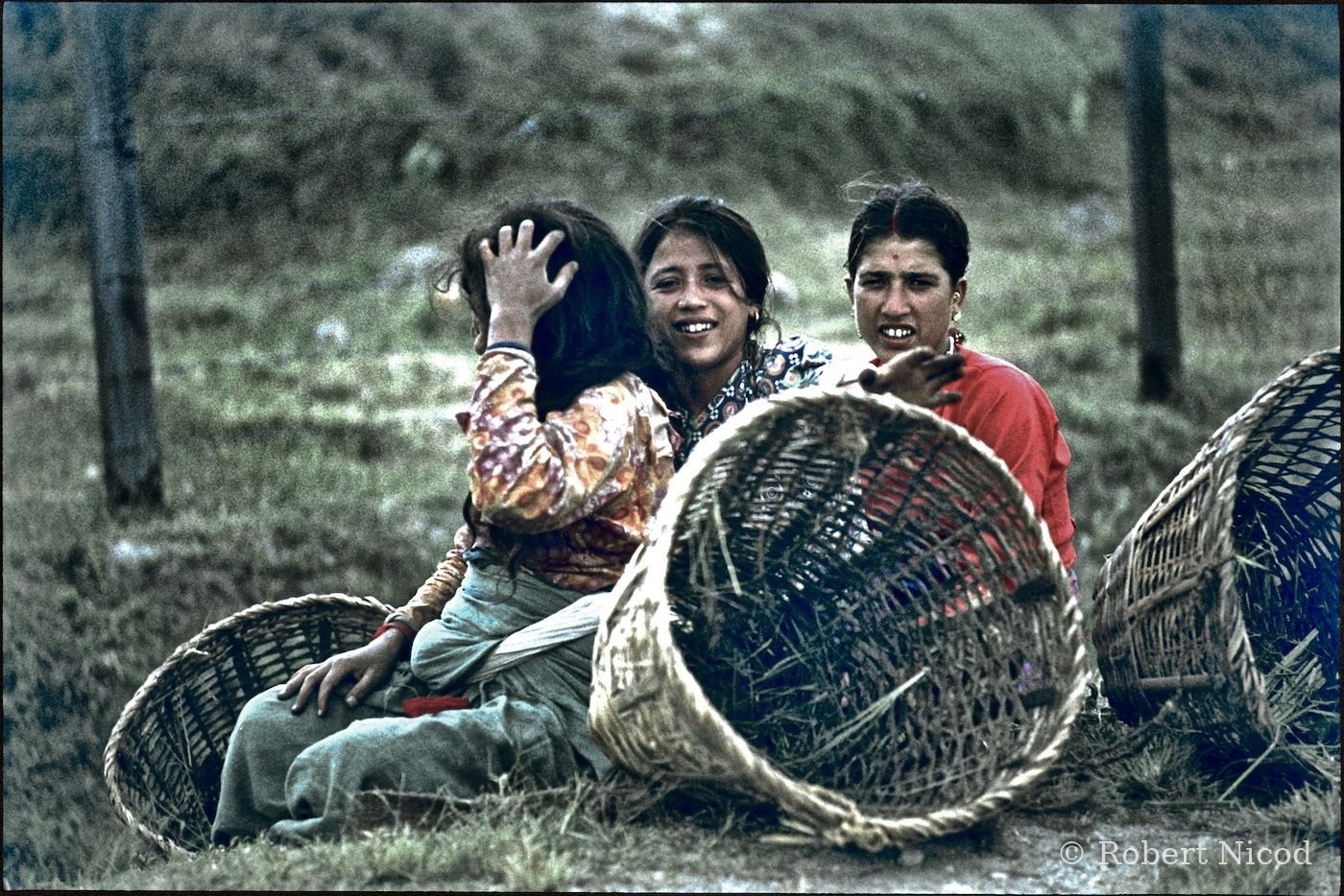 Nepal 1977 — Two tourists, three curious women, Kathmandu 1977