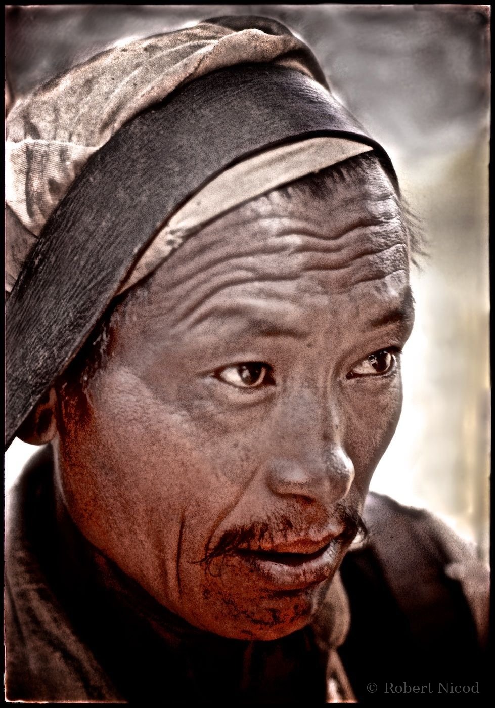 Nepal 1977 — A leather strap to carry, twice their own weight, Kathmandu 1977