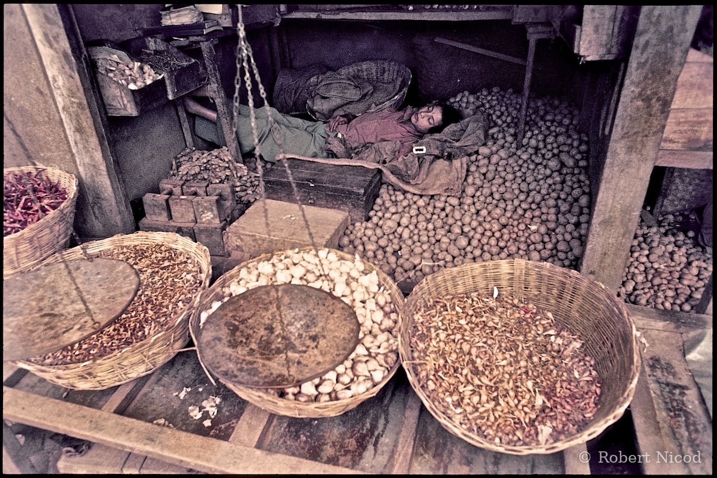 Nepal 1977 — A nap between two customers, Kathmandu 1977