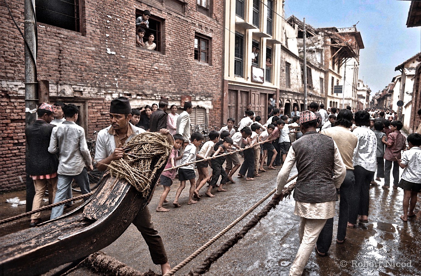 Nepal 1977 — Indra Jatra festival. Townspeople and children pull the chariot by sheer arm strength, Kathmandu 1977