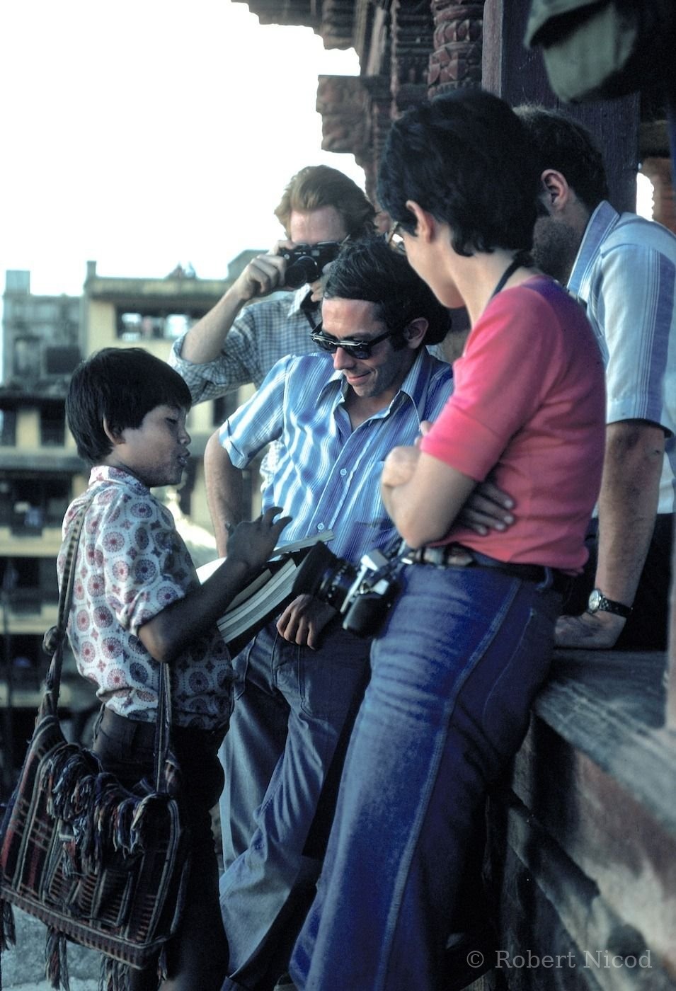 Tourists in Asia — Meeting a young vendor, Kathmandu 1977