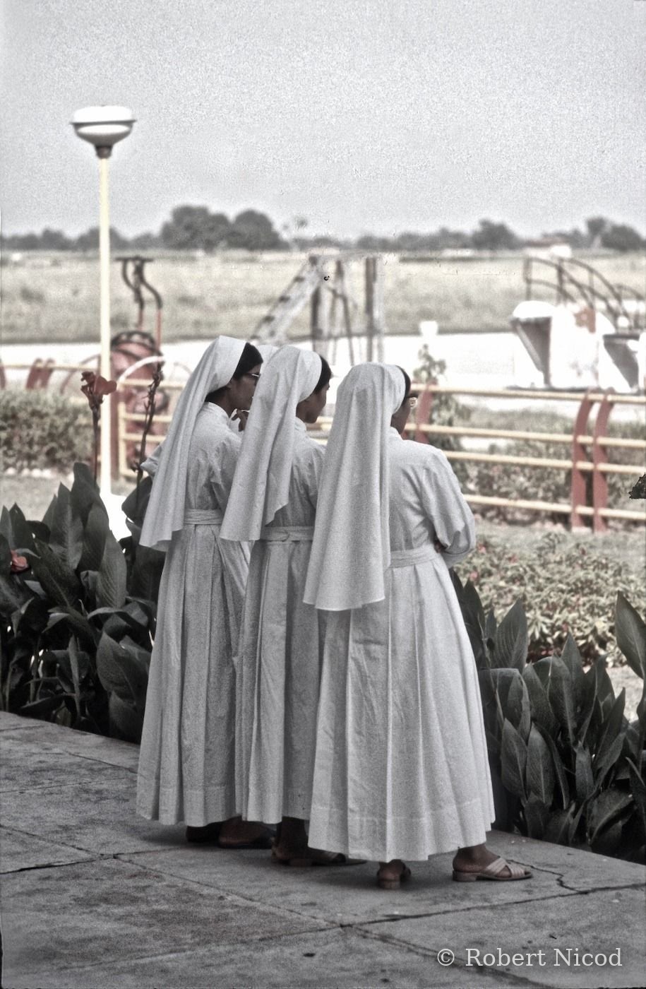 Tourists in Asia — Three nuns, Christian and Indian, Delhi Airport 1977