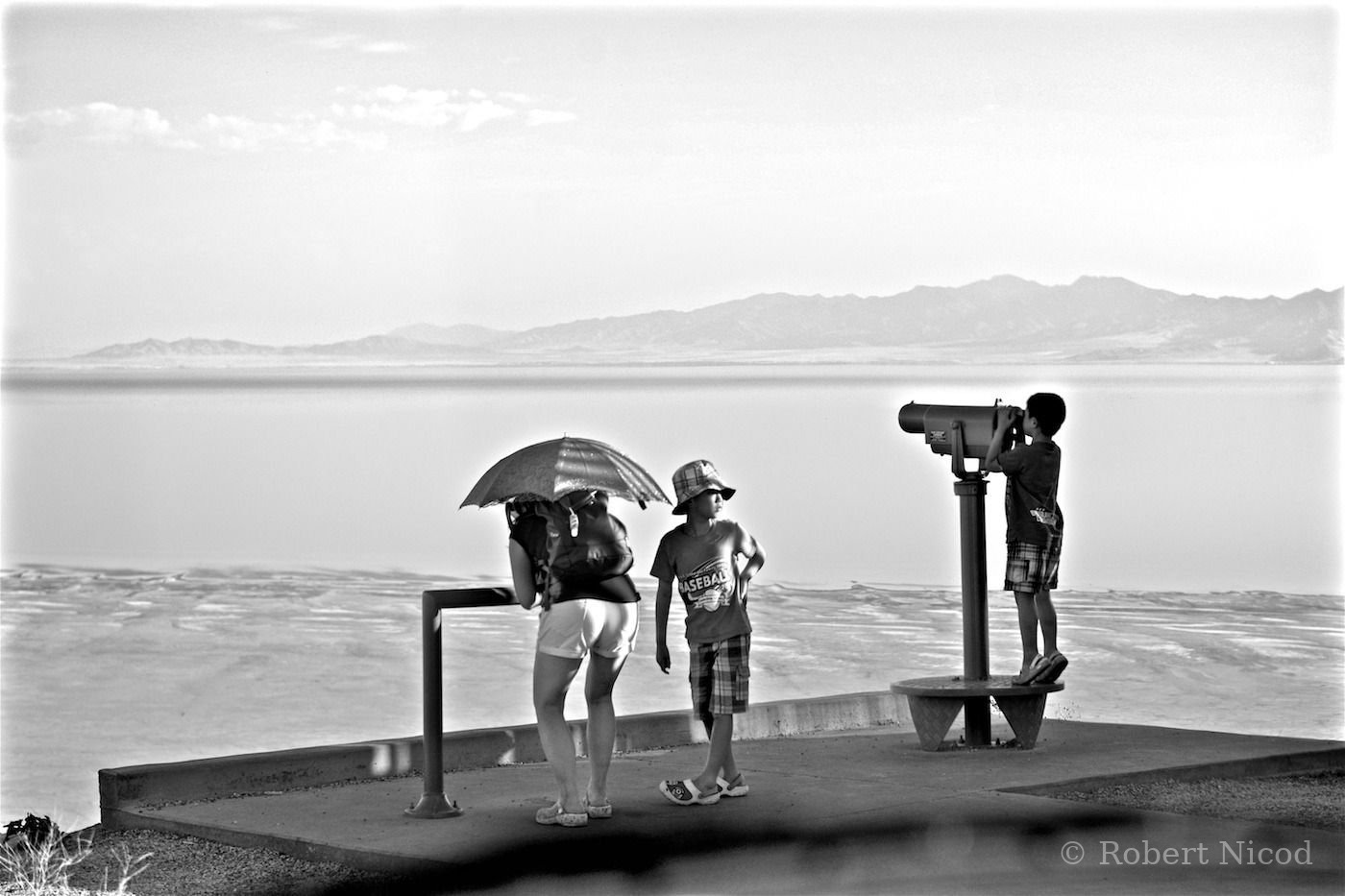 Tourists in the West — Facing the vast horizon, Great Salt Lake, Utah