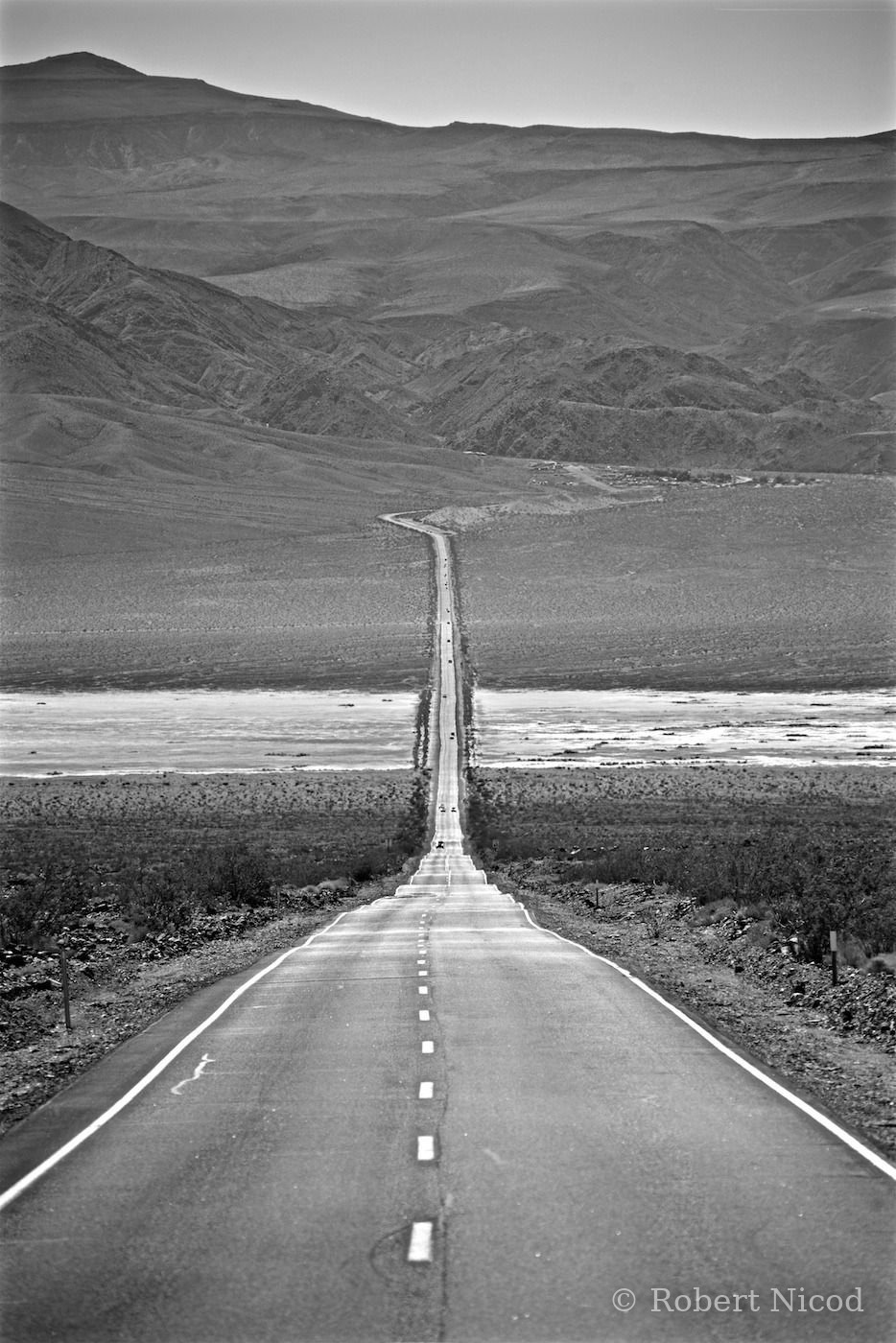 Tourists in the West — 10 km of straight road, California